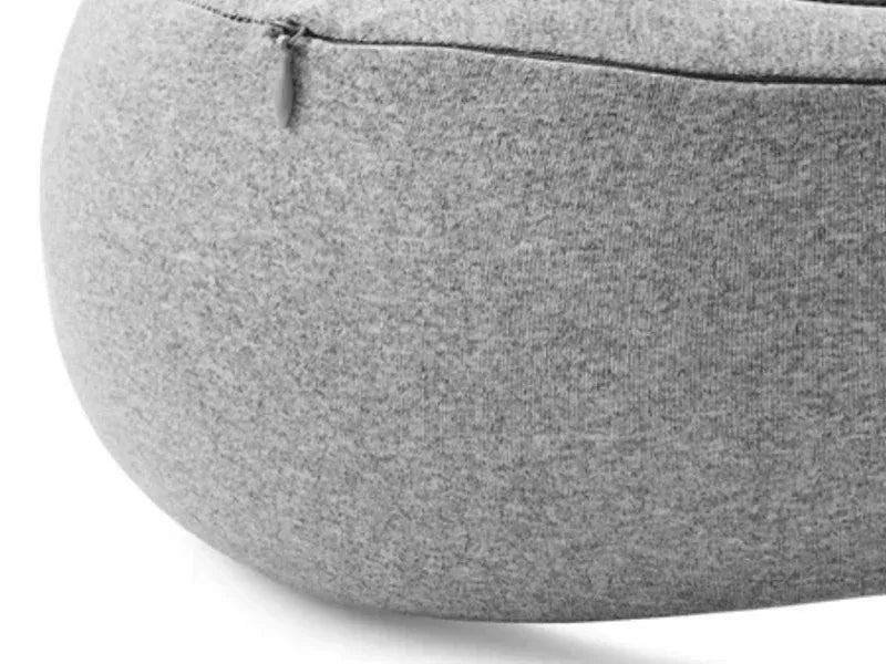 Close-up of the heather grey wool-blend cover showing the knit texture and hidden zip